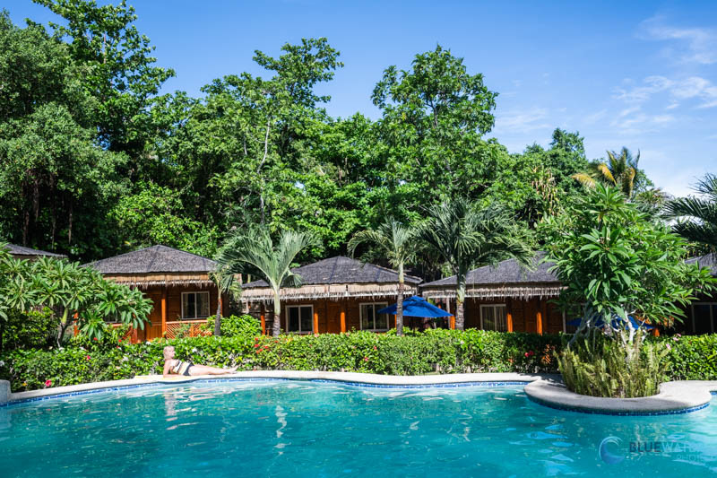 The Pool and Bungalows of Magic Oceans are nestled in the jungle on the water